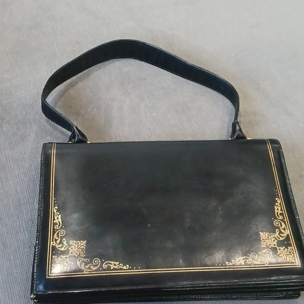 Black Shoulder Bag with Gold Accents